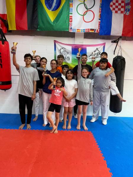 Student building fitness and confidence in taekwondo bolton classes.